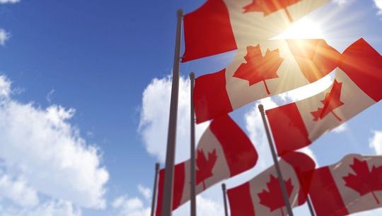 Canada flags shutterstock_626961950.jpg